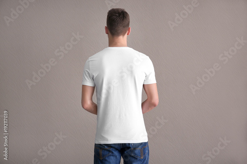 Young man in color t-shirt ...