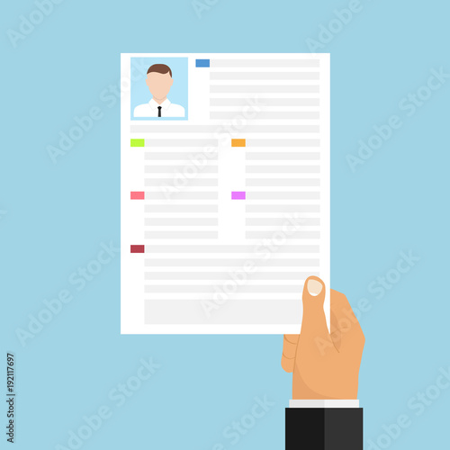 The hand holds a resume. To get a job. Provide a resume.