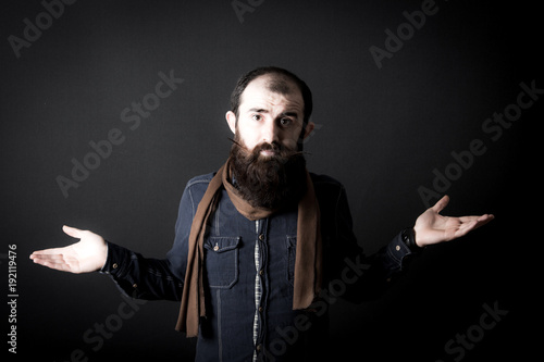 male model shoots in studio environment photo