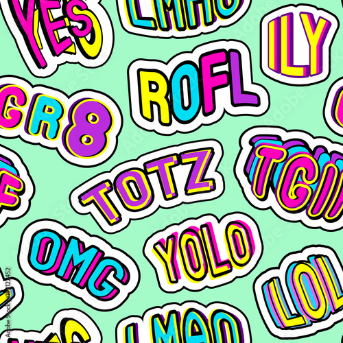 Colorful seamless pattern with patches, stickers, badges, pins with words "totz", "tgif", "yolo", "lol", "omg", "gr8", "rofl", "ily", "lmao". Green background. 