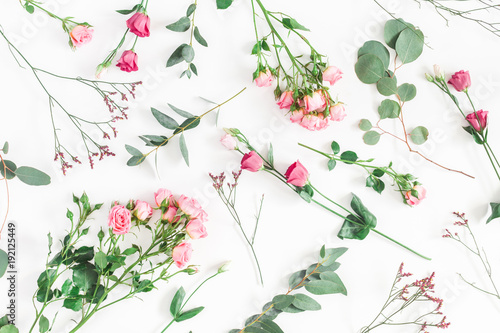 Wallpaper Mural Flowers composition. Pattern made of various pink flowers and eucalyptus branches on white background. Flat lay, top view Torontodigital.ca