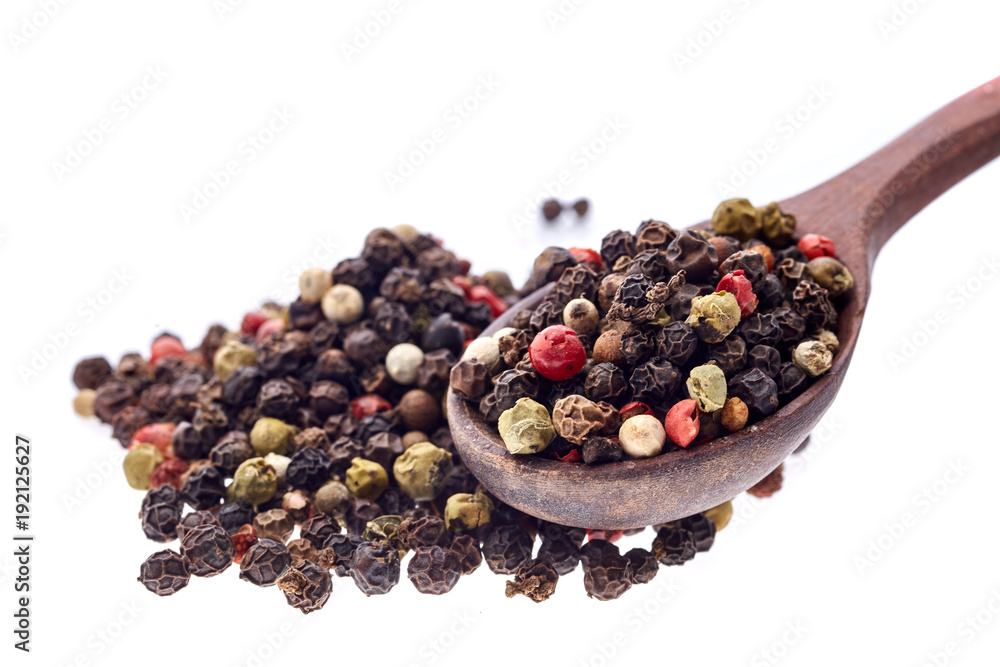 Shichimi pepper in Wooden spoon on white background,Blend of spices Shichimi pepper in Wooden spoon on white background,Blend of spices