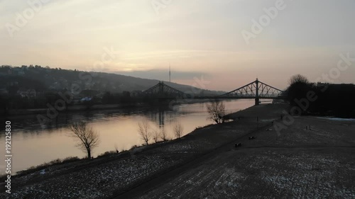 Aerial drone shot of Dresden Loschwitzer Bridge Blaues Wunder early morning with beautiful sunrise scenery Germany photo