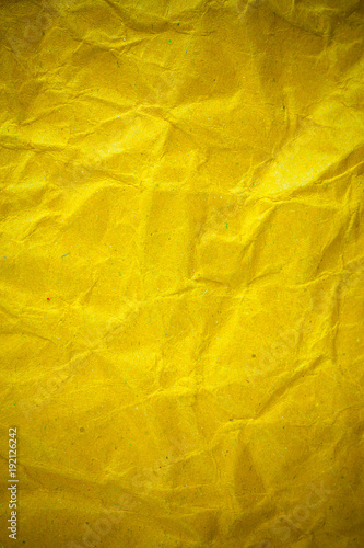 Texture crumpled yellow paper background.