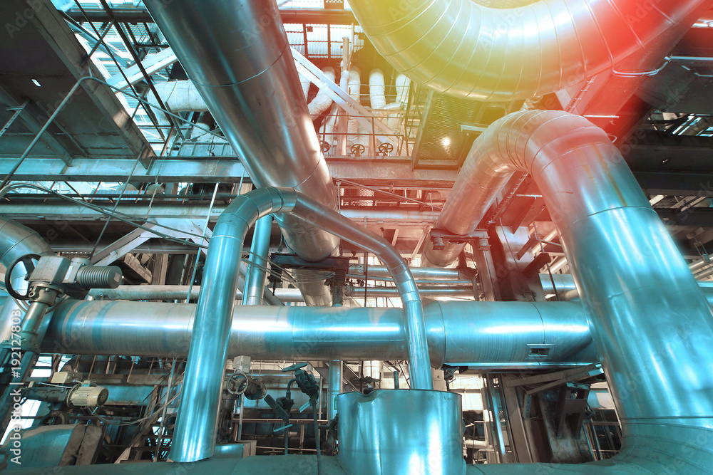 Industrial zone, Steel pipelines and equipment in blue tone Industrial zone, Steel pipelines and equipment in blue tone