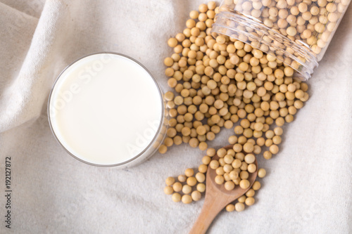Top view of soybeans and soy milk in a glass