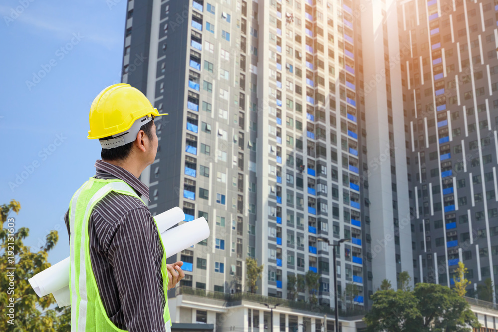 construction engineer at large condominium building site construction engineer at large condominium building site
