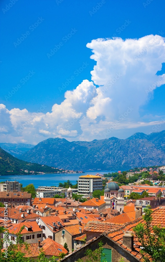 A small old European city surrounded by the sea and mountains. View of the old town Kotor. Montenegro.
