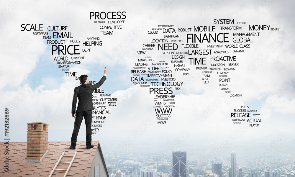 Businessman on brick roof draw world map as concept of globalization. Mixed media