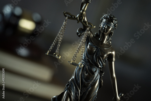 Law and Justice concept. Brown wooden background