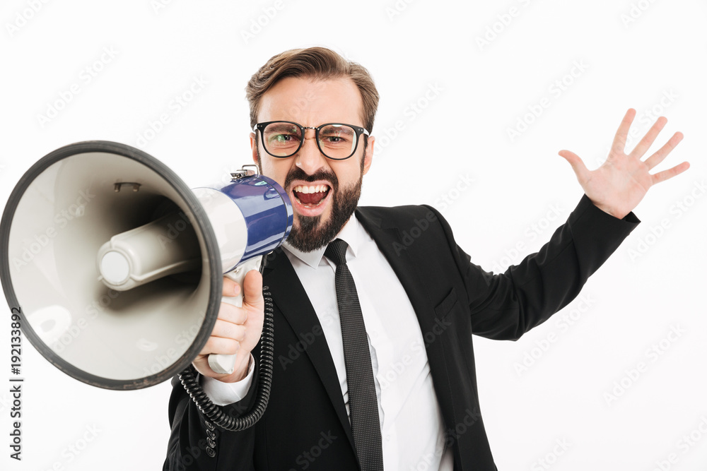 Displeased angry screaming young businessman Displeased angry screaming young businessman