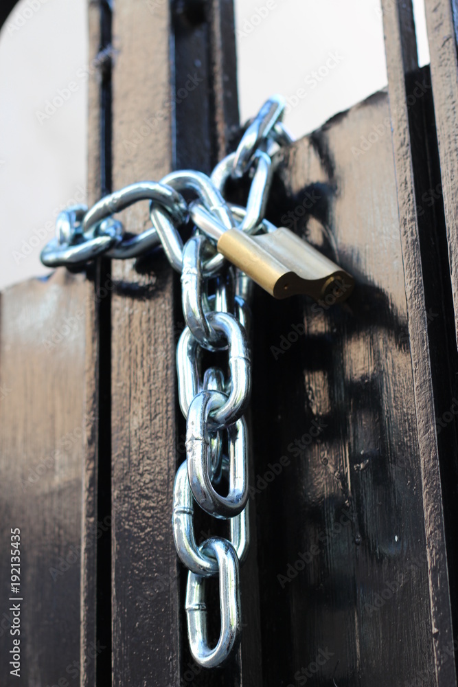 Padlock with chain on old gate photography. Lock object protect. Stock  Photo | Adobe Stock