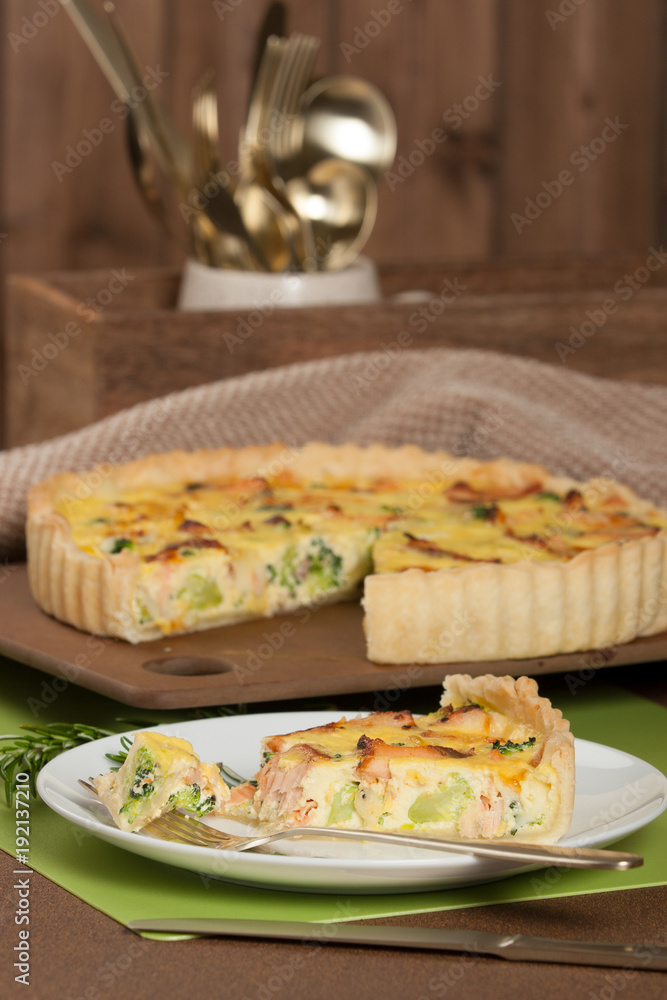 Home Baked Salmon Quiche With Broccoli. Traditional British Food. Home Baked Salmon Quiche With Broccoli. Traditional British Food.