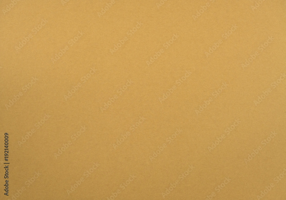 Natural light brown colored paper texture Natural light brown colored paper texture