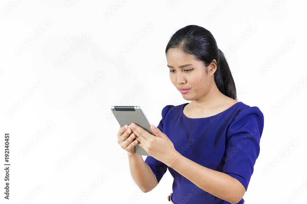 Asian business woman using tablet and blue suit ,isolated on white background Asian business woman using tablet and blue suit ,isolated on white background