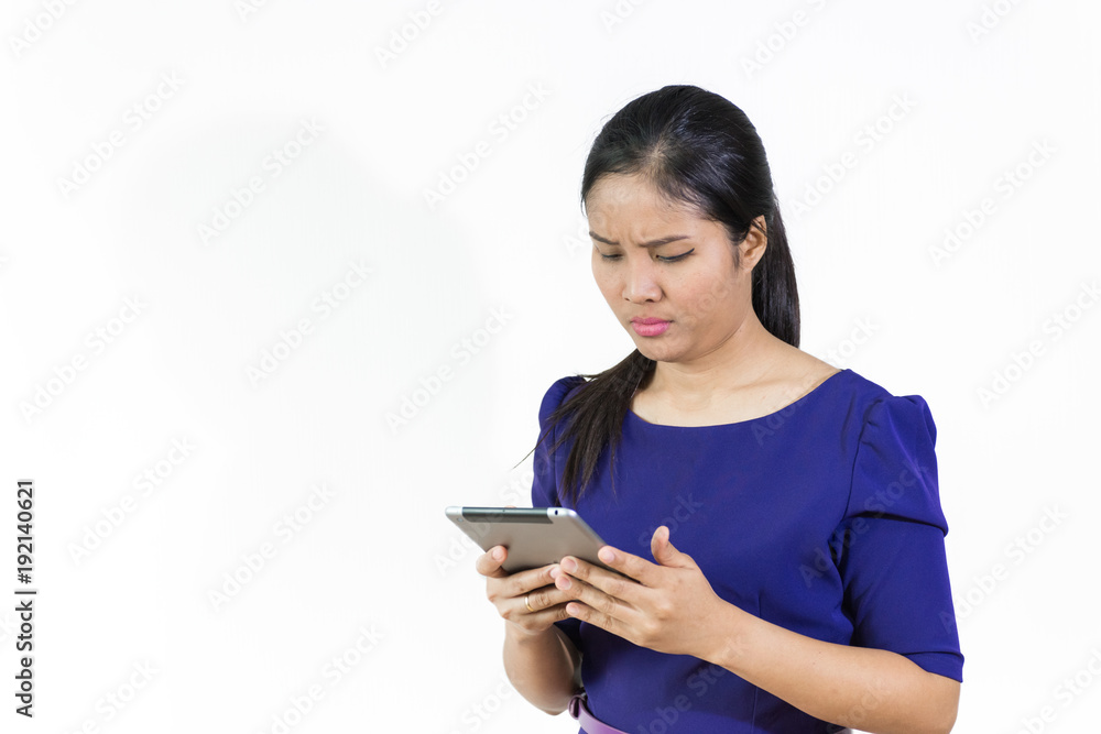 Asian business woman using tablet and blue suit ,isolated on white background Asian business woman using tablet and blue suit ,isolated on white background