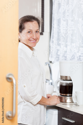 woman preparing coffee