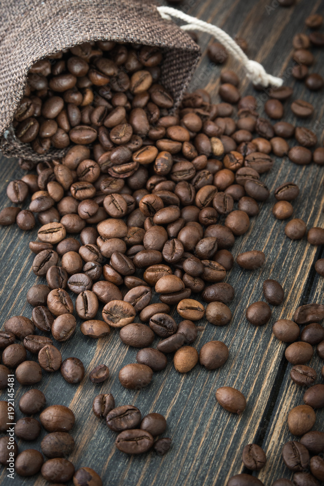 A bag of roasted arabica coffee beans A bag of roasted arabica coffee beans