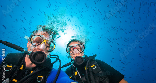 Couple of scuba divers, portrait photography