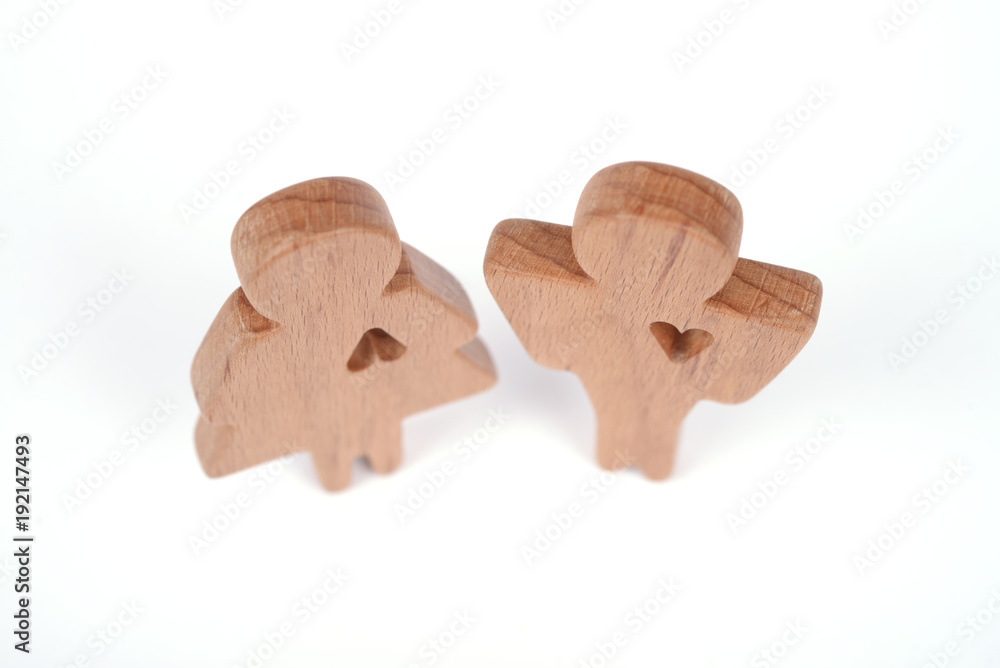Silhouettes of man, woman and heart cut out inside the shapes on a white background. Happy couple in love. Male and female, different love ways Silhouettes of man, woman and heart cut out inside the shapes on a white background. Happy couple in love. Male and female, different love ways