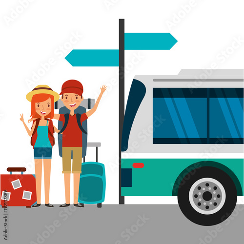 happy couple tourists with luggage in the bus stop