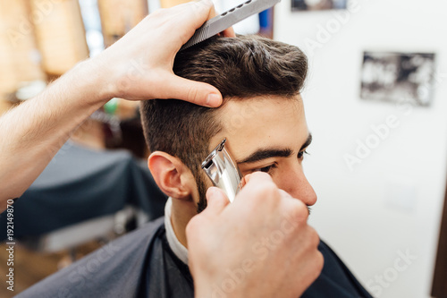 Barber shave and modeling beard at the hair salon
