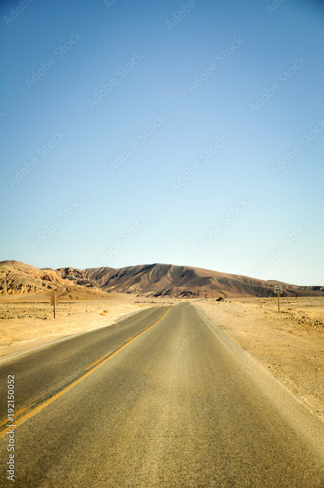 Long Desert Road in the Middle of the Death Valley