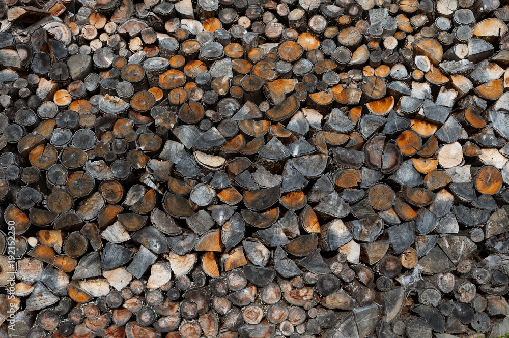 Pile of cut wood as background, texture. Firewood Pile of cut wood as background, texture. Firewood
