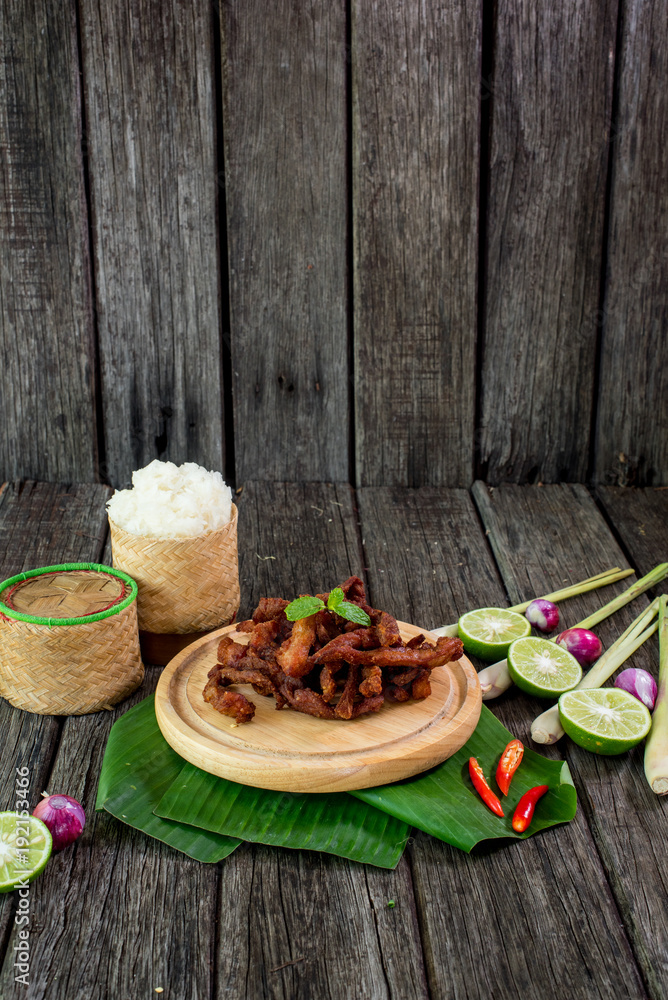 Thai food deep fried beef slice with herbs, Esan food, Thai Food, Selective focus Thai food deep fried beef slice with herbs, Esan food, Thai Food, Selective focus
