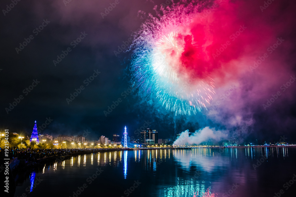 beautiful multicolored New Year's fireworks on the embankment of Baku, Azerbaijan
