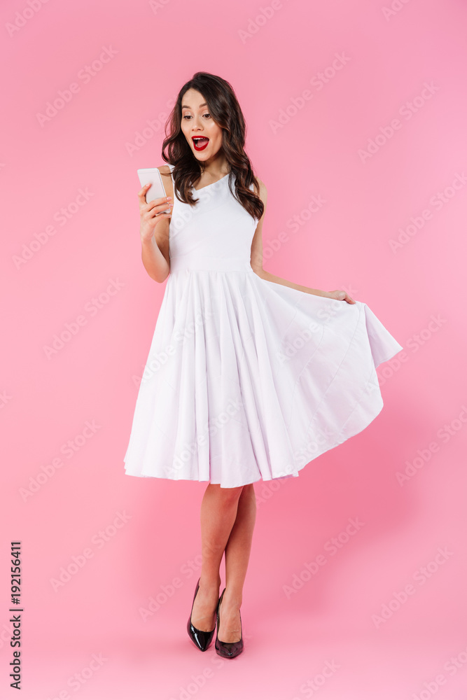 Full length portrait of a surprised young asian woman Full length portrait of a surprised young asian woman