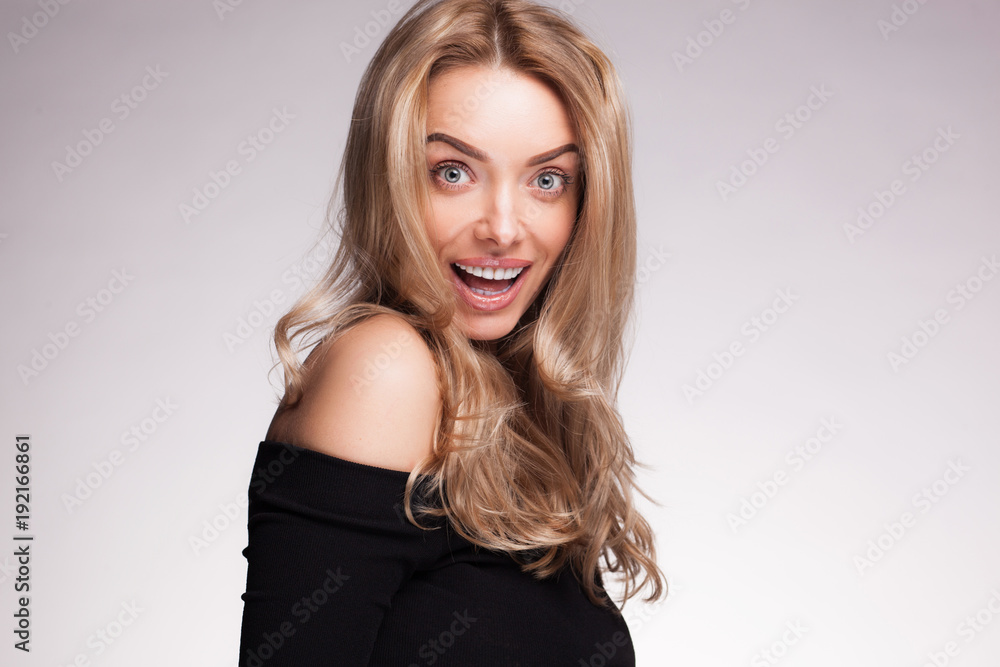 closeup portrait of beautyful blond surprised woman with clean fresh skin closeup portrait of beautyful blond surprised woman with clean fresh skin