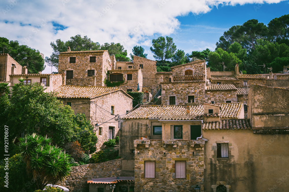 Fototapeta premium Ancient streets and yards of Tossa De Mar city, Catalonia, Spain, Europe