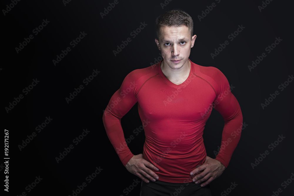 Fototapeta premium Fitness portrait of a young man bodybuilder