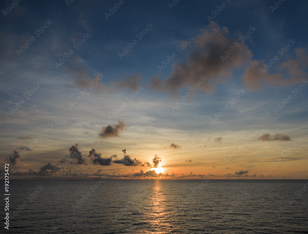 Blue sea and blue sky with white cloud and sunrise up from sea in gulf of Thailand. Blue sea and blue sky with white cloud and sunrise up from sea in gulf of Thailand.