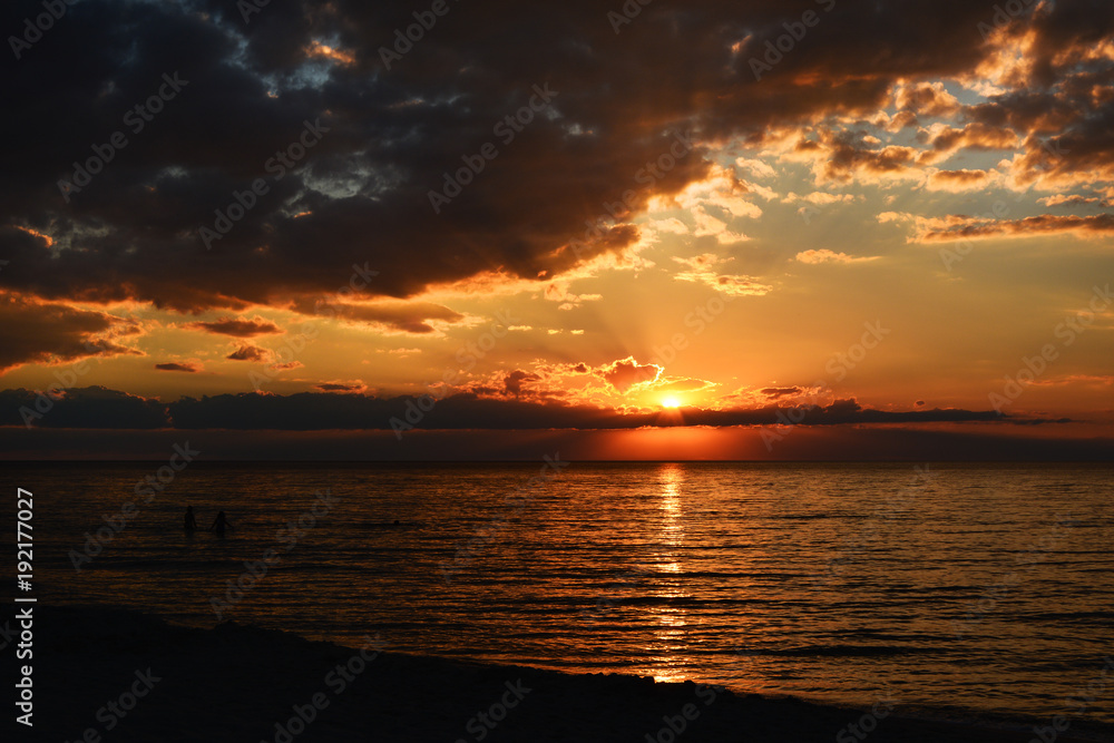 Fototapeta premium beutiful orange sunset on the sea