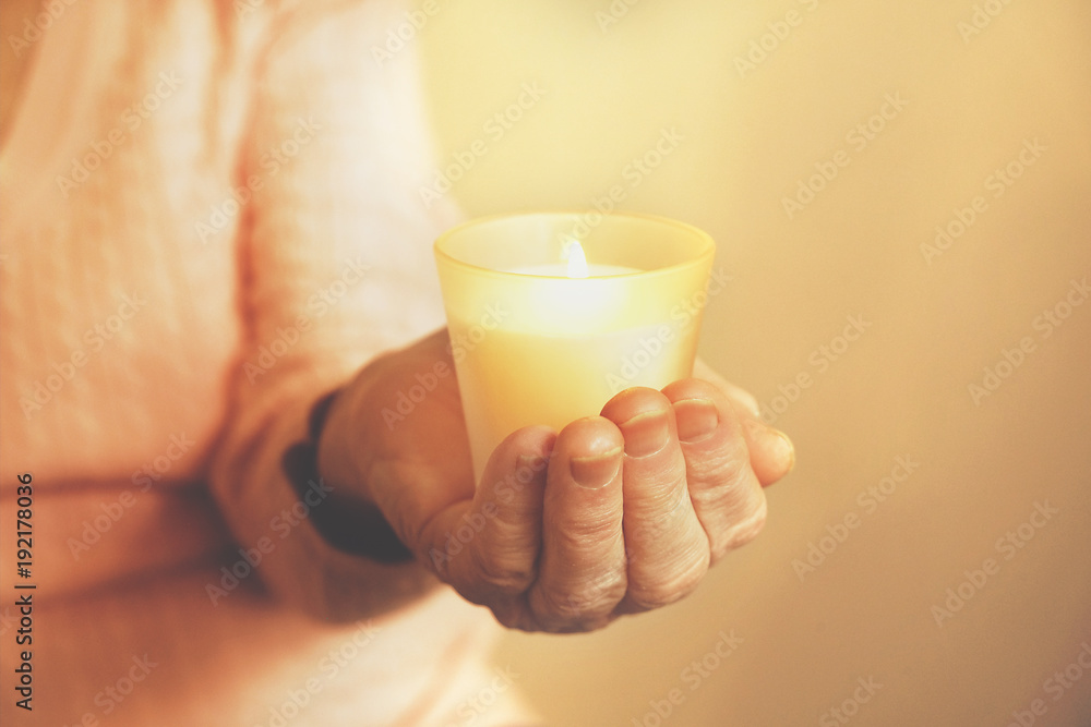 Close up of mature womans hands. Health care giving, nursing home. Parental love of grandmother. Old age related diseases.