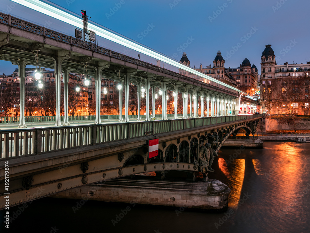 Night scene of Pont de bir-hakeim in Paris.