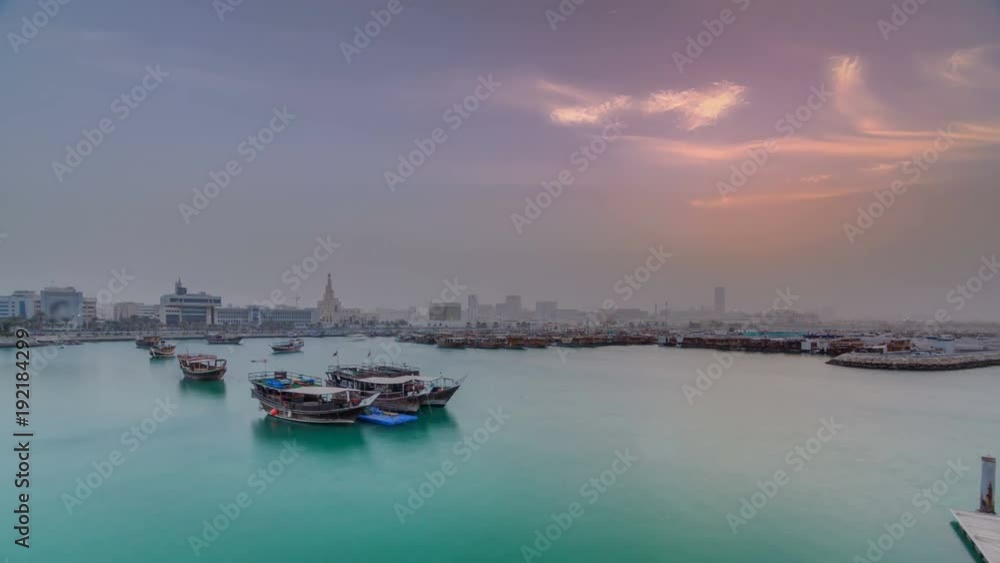 Sunset at Doha Bay timelapse with Traditional Wooden Dhow Fishing Boats. Sunset at Doha Bay timelapse with Traditional Wooden Dhow Fishing Boats.