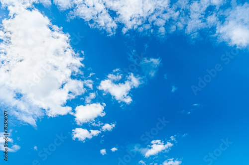 Blue Sky with with clouds on the foreground and blue sky background © BBandSIRI