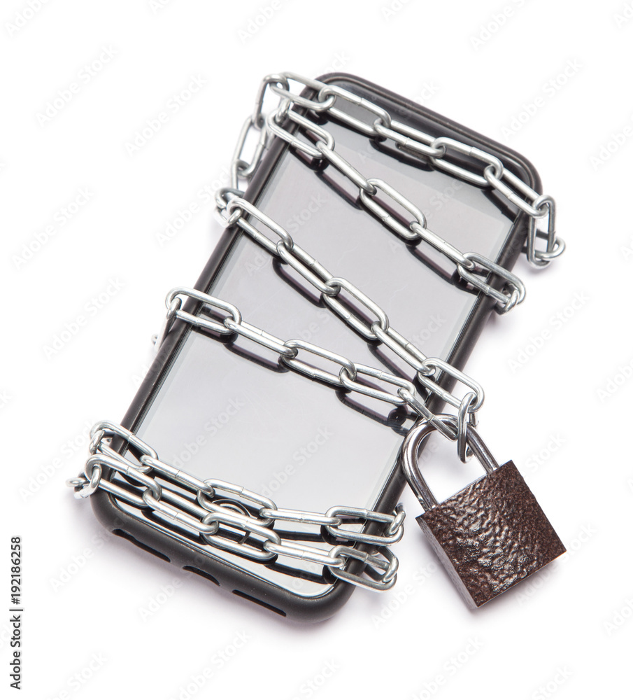 Mobile phone is password protected. The phone is wrapped around the chain and locked. Isolation on a white background Mobile phone is password protected. The phone is wrapped around the chain and locked. Isolation on a white background