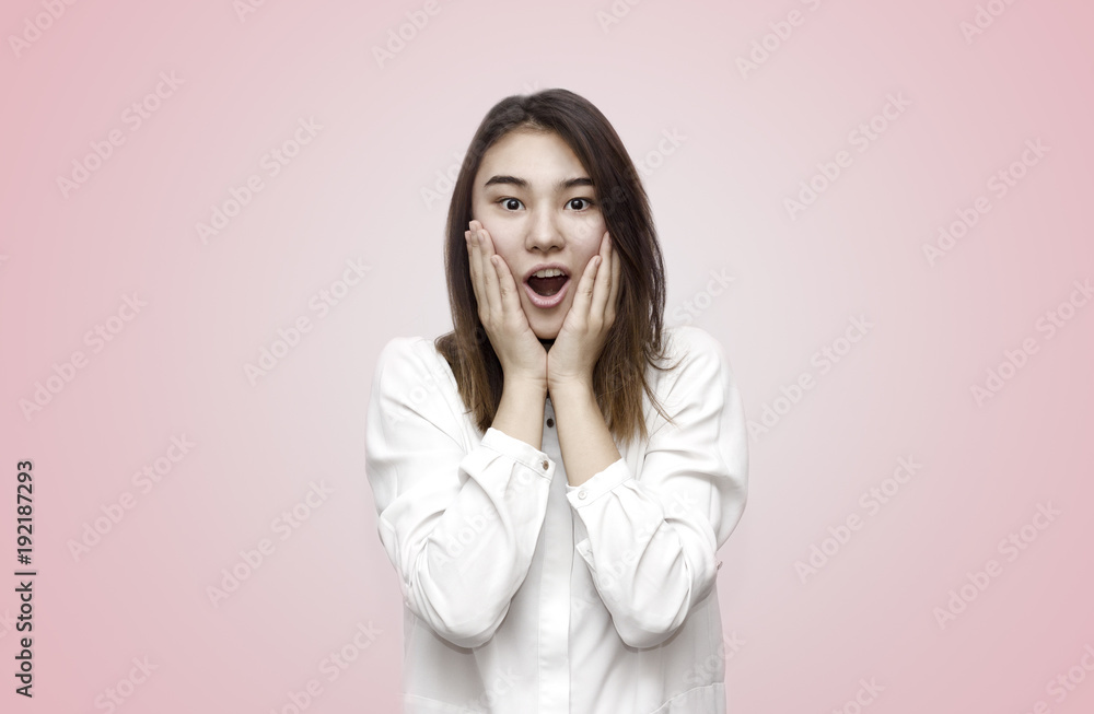 Portrait of extremely excited woman has appealing appearace stares at camera with unbelievable gaze, suprised face. People, facial expressions, emotions concept Portrait of extremely excited woman has appealing appearace stares at camera with unbelievable gaze, suprised face. People, facial expressions, emotions concept