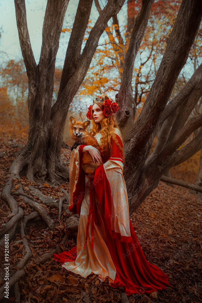 Woman in medieval clothes with a fox