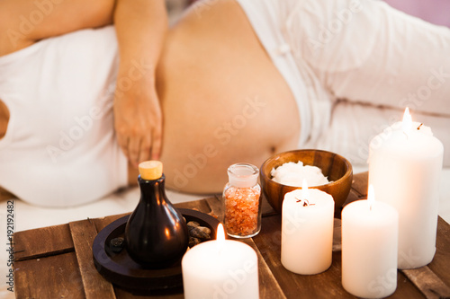 Young pregnant woman relaxing at Spa salon, Spa treatment