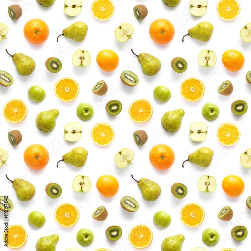 Fototapeta Naklejka Na Ścianę i Meble -  Food texture. Seamless pattern of fresh  various fruits. Pears, red and green apples, slices of tangerines, oranges, kiwi, isolated on white background, top view, flat layout.