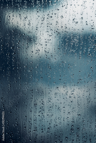 water drops of rain on a window glass. Rainy day