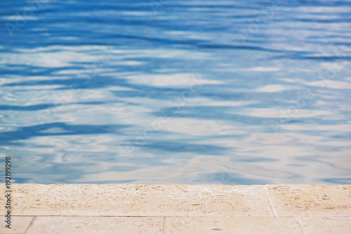 Private poolside as abstract summer background photo