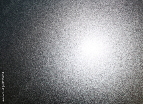 Silvery metal surface with glare