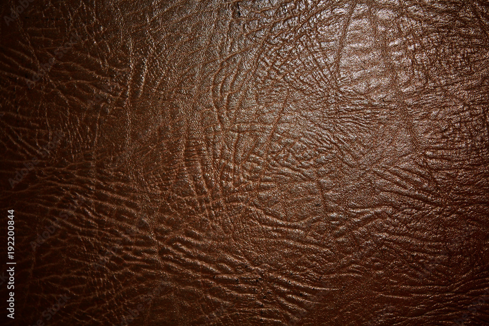 Textural background of brown leatherette Textural background of brown leatherette