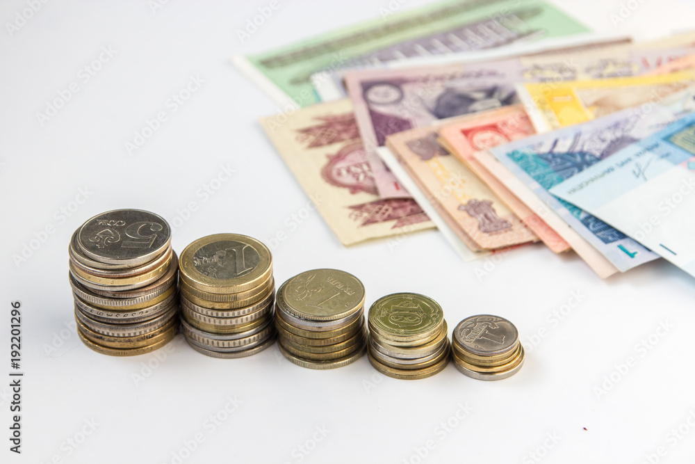 Money coins and banknotes from multiple countries Money coins and banknotes from multiple countries